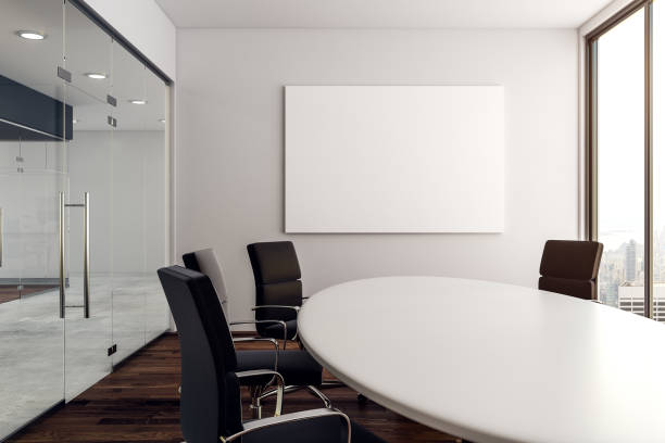 Modern conference room with poster Modern conference room with empty poster and city view. Mock up, 3D Rendering meeting room stock pictures, royalty-free photos & images