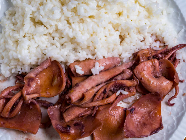 istock Stewed squid with white rice in the plate 942178484