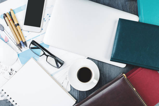 istock Modern desktop with smartphone and supplies 942181478