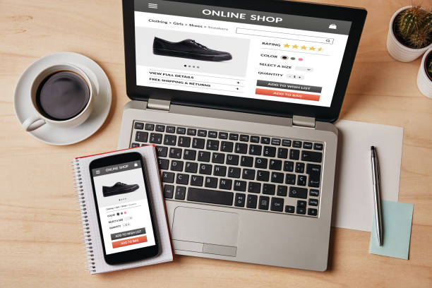 istock Online shop concept on laptop and smartphone screen 942181682