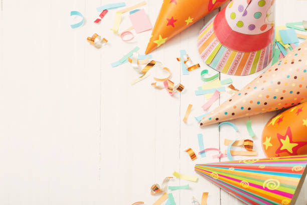istock birthday decoration on white wooden background 942183680
