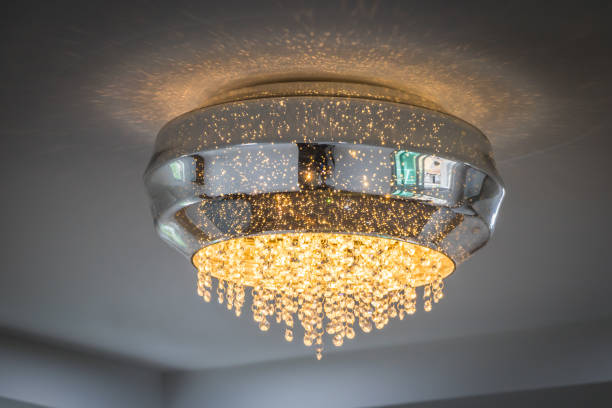 istock The light from the chandelier hanging from the ceiling. 942184034