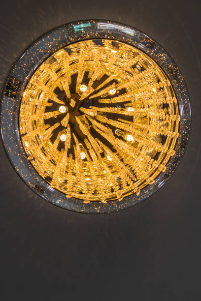 istock The light from the chandelier hanging from the ceiling. 942184064