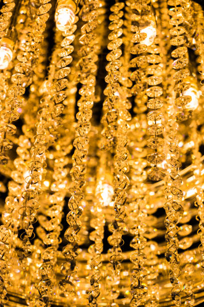 istock The light from the chandelier hanging from the ceiling. 942184070