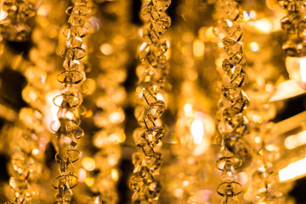istock The light from the chandelier hanging from the ceiling. 942184086