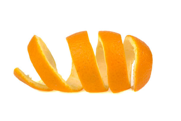 istock orange peel twisted into a spiral isolated on white background 942184466