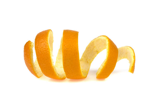 istock peel of an orange spiral on a white background 942184470