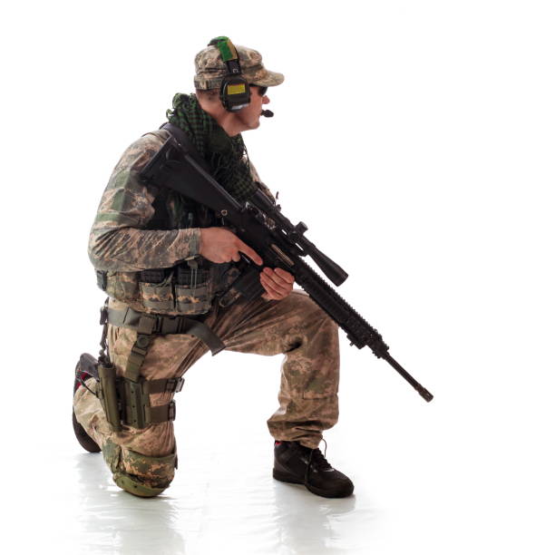 istock man military outfit a soldier in modern times on a white background in studio 942184496