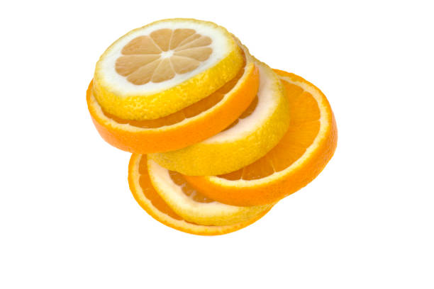 istock fruit lemon and orange sliced slices isolated on white background 942184500