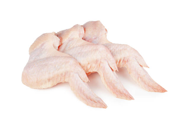 istock Raw chicken wings isolated on white background 942185518