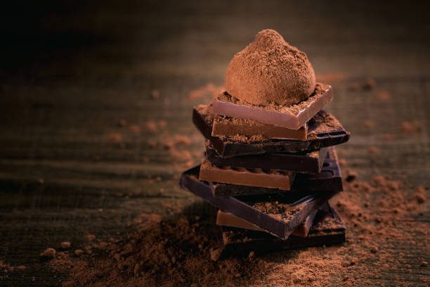 Assortment of dark and milk chocolate stack, truffles