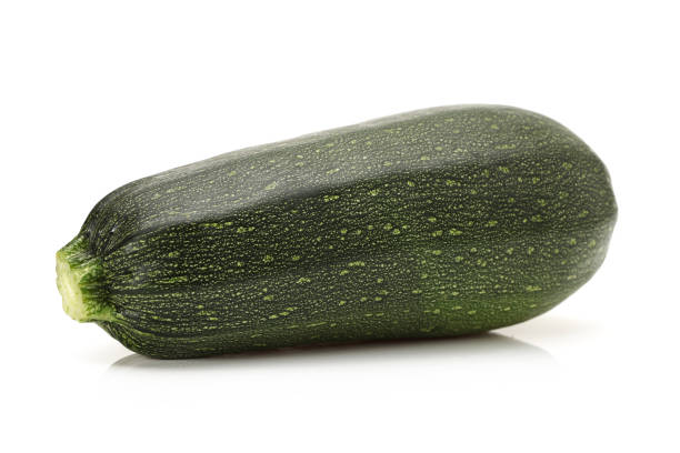 istock fresh zucchini isolated on white background 942188660
