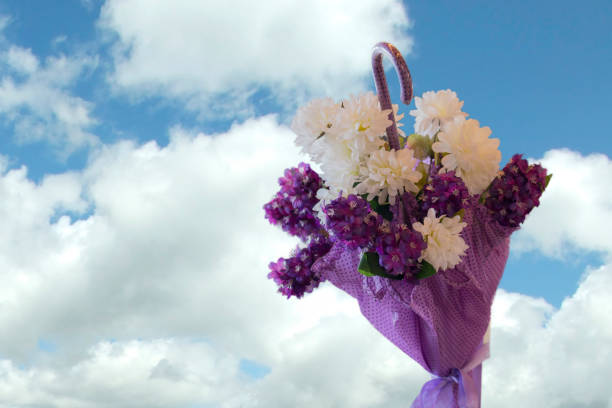 Flower umbrella with sky background