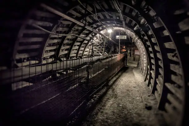 Photo of Coal mine underground corridor with belt conveyor for hard coal