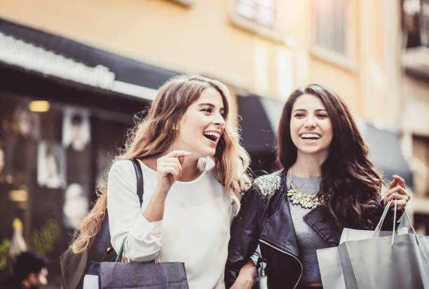 istock Young Women Shopping in Old Town 942189552