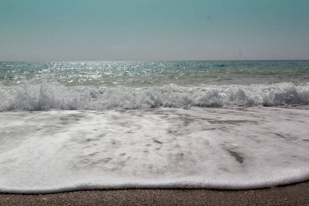 Soft wave of ocean on the sandy beachSoft wave of ocean on the sandy beachSoft wave of ocean on the sandy beach