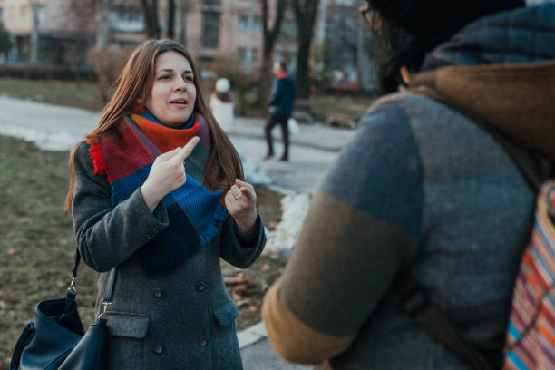 istock Having a sign conversation with a deaf friend 942192480