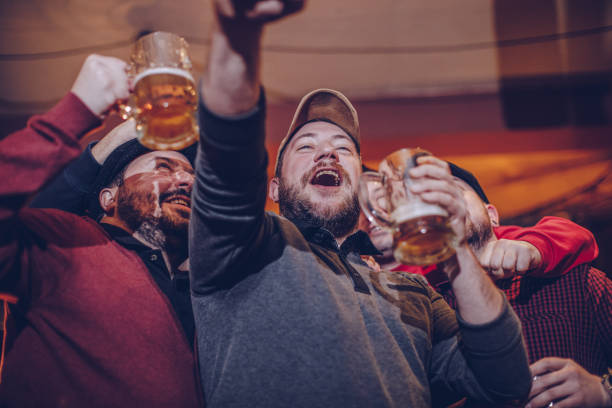 istock Soccer fans watching game 942201810