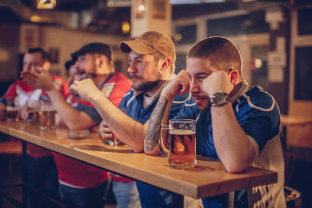 istock Soccer fans watching game 942206358