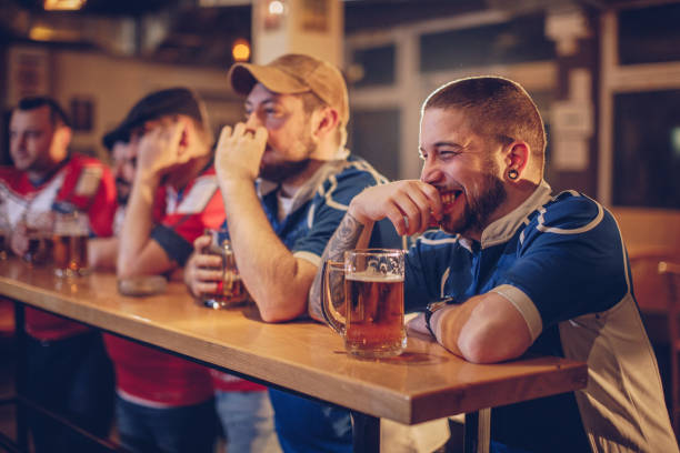 istock Soccer fans in bar 942210394