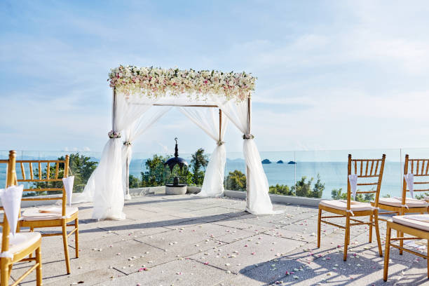 istock Wedding venue setup on the hill with folding lawn chairs with panoramic ocean background view, Samui, Thailand 942213862