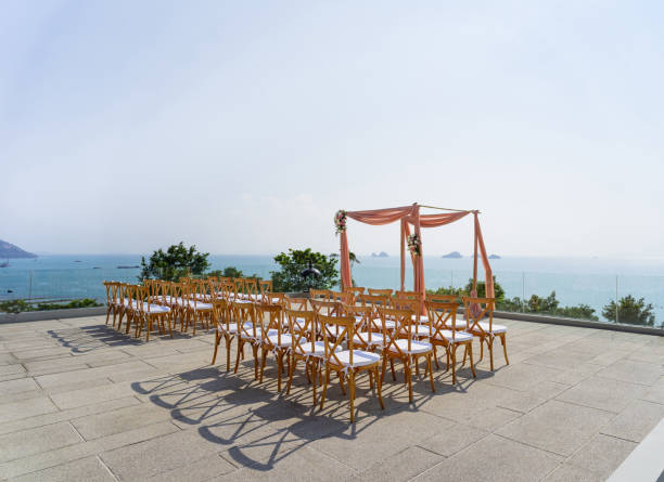 istock Wedding venue setup on the hill with folding lawn chairs with panoramic ocean background view, Samui, Thailand 942214480