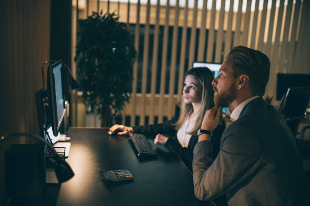 istock Business people working late in the office 942217634