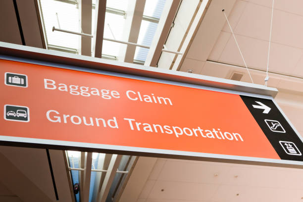 istock Baggage Claim and Ground Transportation Sign 942221702