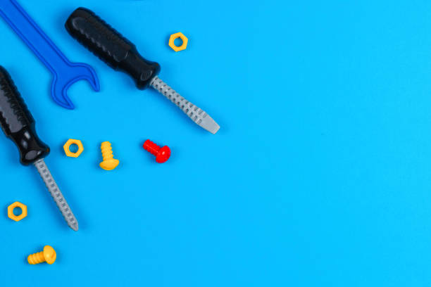 istock Toys background. Toy tools on blue background. Top view 942221994