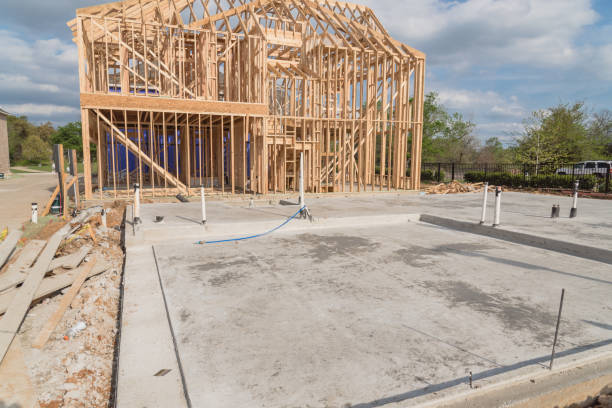 istock Slab on grade foundation concrete for timber frame house in USA 942224864