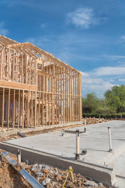 istock Slab on grade foundation concrete for timber frame house in USA 942225948