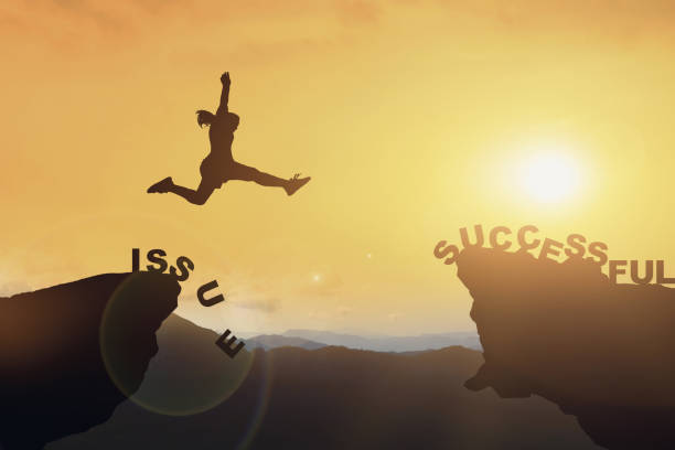 istock Silhouette of people jumping 942230728