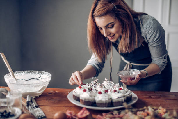 istock Young woman making sweet desert 942237976