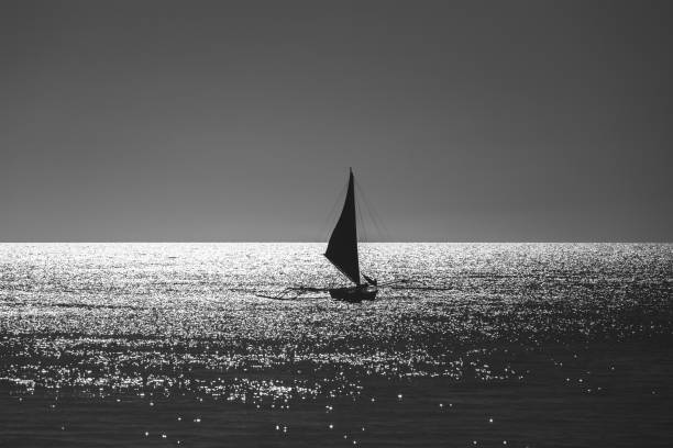 istock One double outrigger sailboat on the sea 942238088