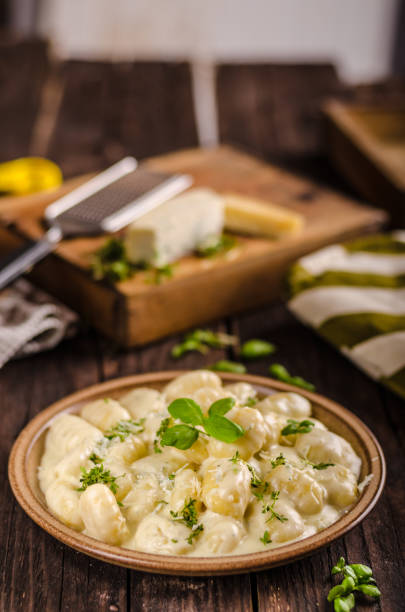 istock Cheese gnocchi with blue cheese sauce and galic 942241720
