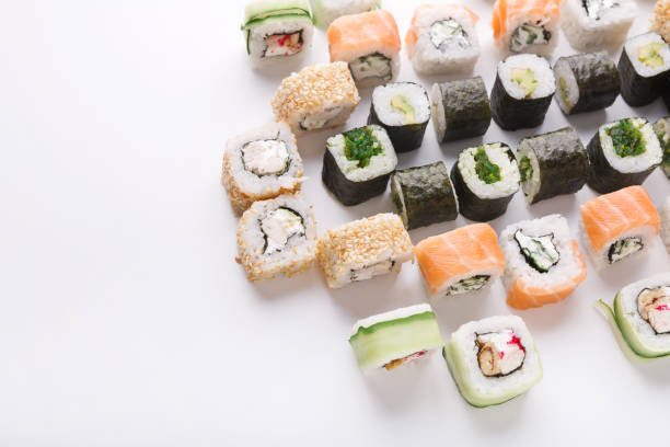 istock Set of assorted sushi, maki and rolls on white 942242172