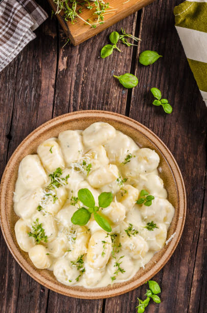 istock Cheese gnocchi with blue cheese sauce and galic 942242530