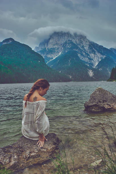 istock Lady at the lake 942247494
