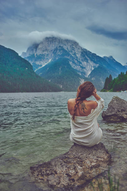 istock Lady at the lake 942247864