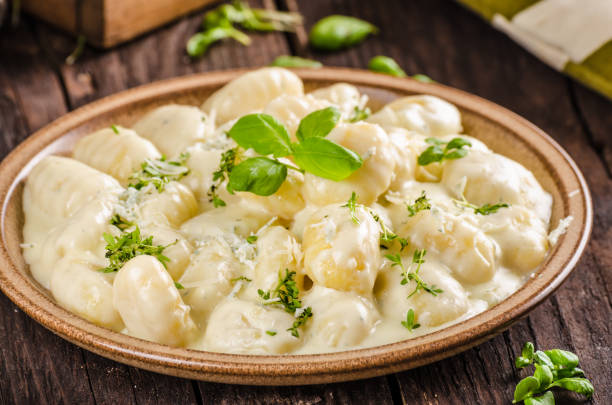 istock Cheese gnocchi with blue cheese sauce and galic 942250000