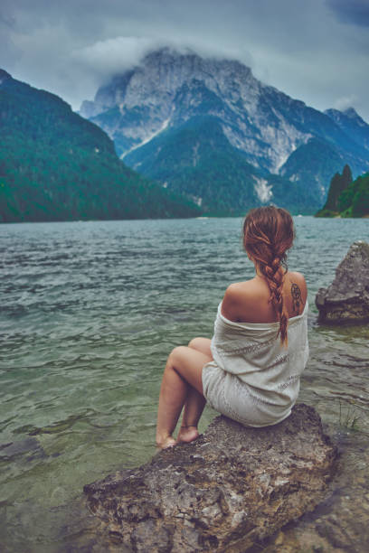 istock Lady at the lake 942250354