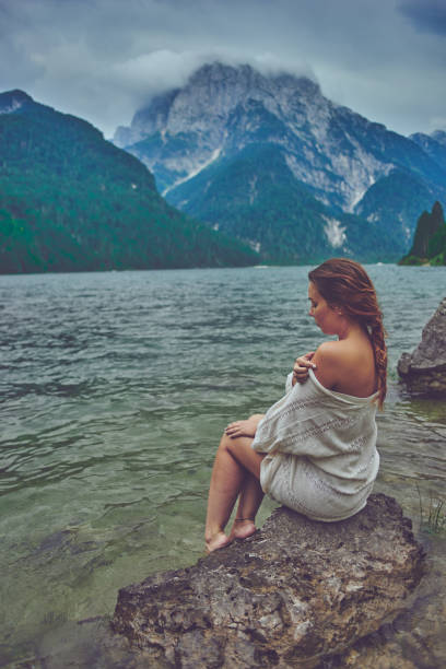 istock Lady at the lake 942250772