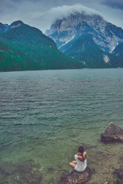 istock Lady at the lake 942251008
