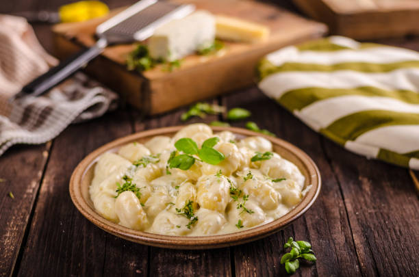istock Cheese gnocchi with blue cheese sauce and galic 942251092