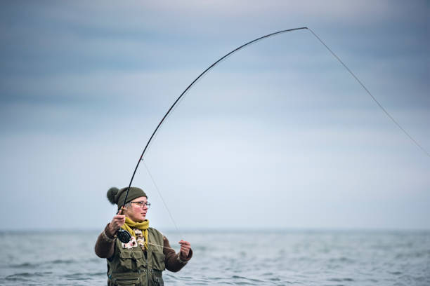 istock Fly Fisherman Casting Out Her Line 942251230