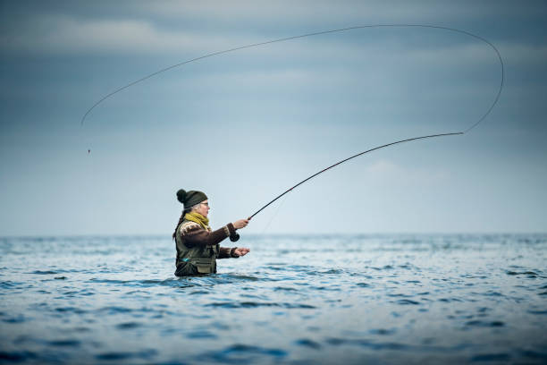 istock Fly Fisherman Casting Out Her Line 942251264
