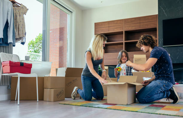 istock Family preparing moving toy box 942251644
