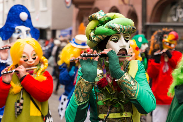 Oberkirch, Germany - February 12, 2023: Traditional carnival parade with traditionell masks and costumes