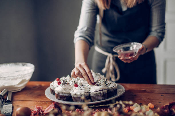 istock Young woman making sweet desert 942256644