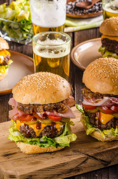 istock Homemade beef burger, caramelized onion, bacon and beer 942261106
